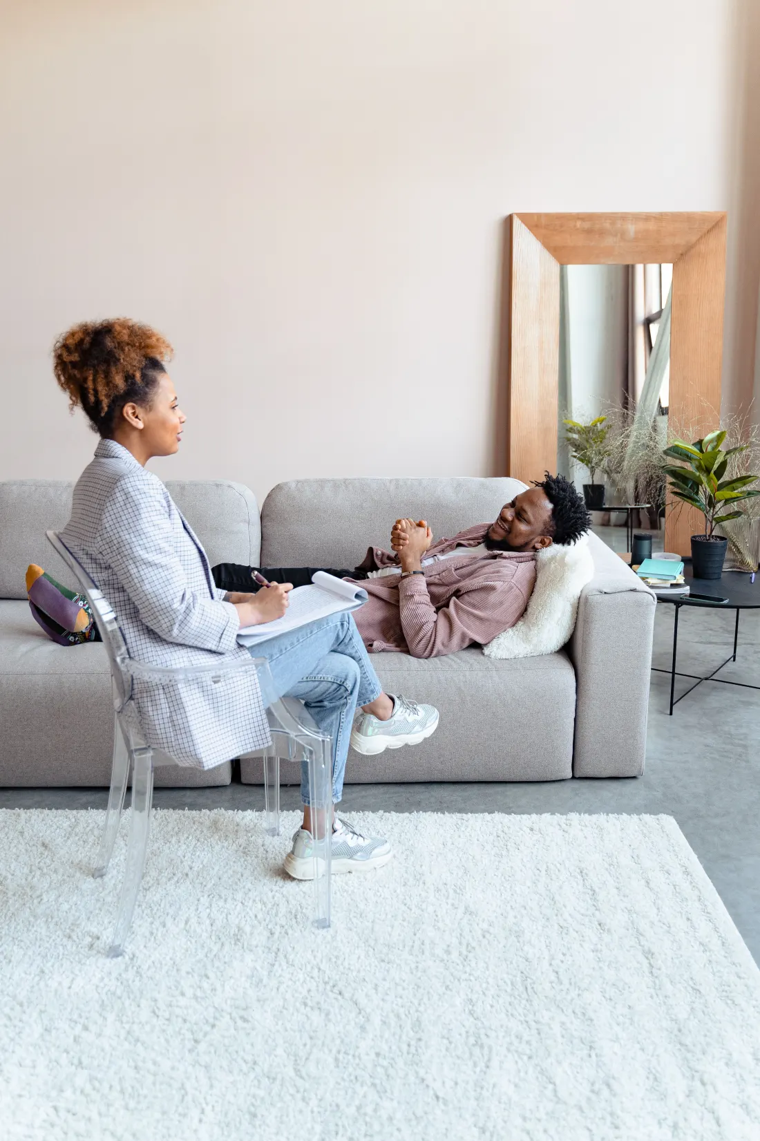 A warm counselling session in a bright room